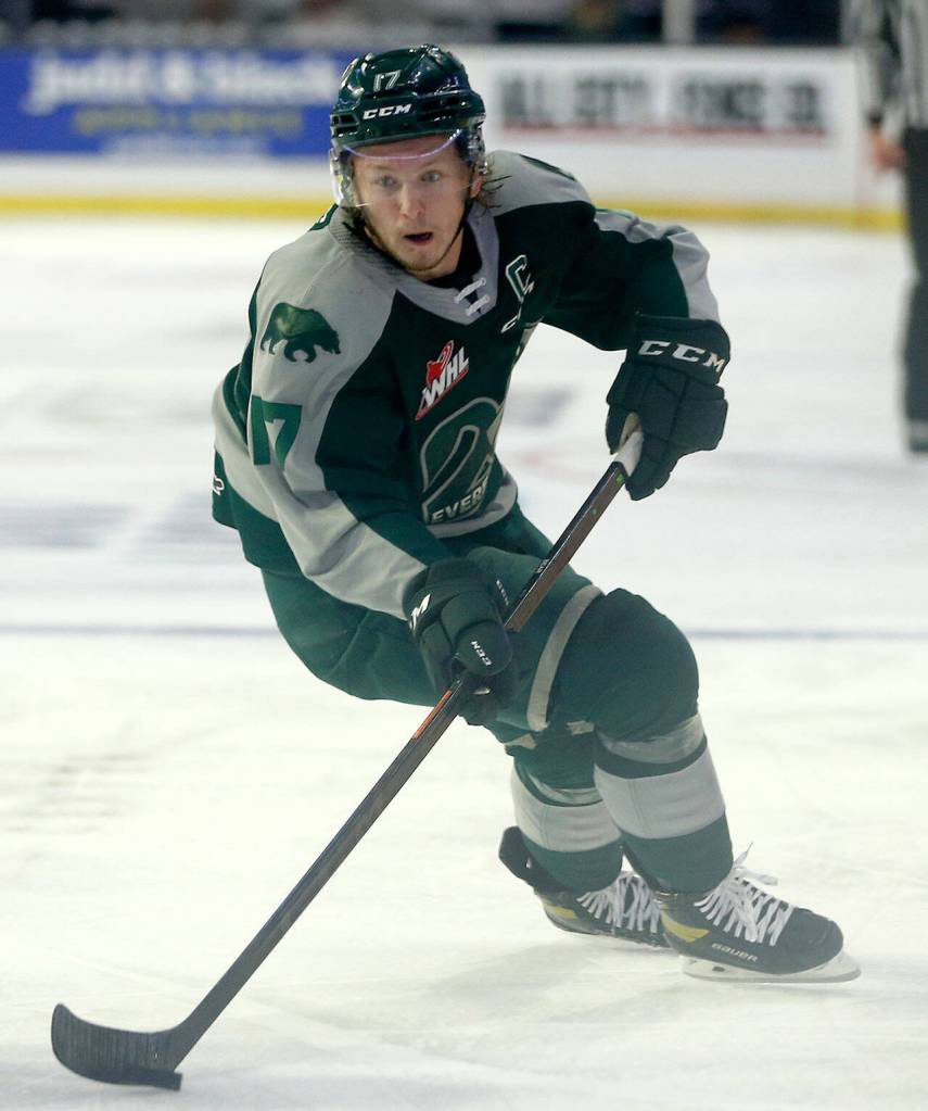Everett Silvertips Jackson Berezowski turns with the puck in the offensive zone during the season opener against the Vancouver Giants on Saturday, Sep. 24, 2022, at Angel of the Winds Arena in Everett, Washington. (Ryan Berry / The Herald)