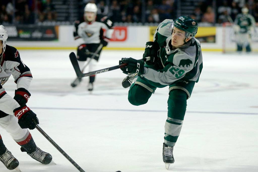 Everett Silvertips Vincent Lamanna puts the puck on net during the season opener against the Vancouver Giants on Saturday, Sep. 24, 2022, at Angel of the Winds Arena in Everett, Washington. (Ryan Berry / The Herald)