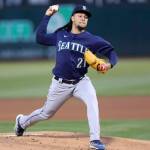 Seattle Mariners' Luis Castillo (21) throws against the Oakland Athletics during the first inning of a baseball game in Oakland, Calif., Tuesday, Sept. 20, 2022. (AP Photo/Jed Jacobsohn)