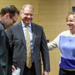 Judge Paul Thompson, left, with Strom Peterson and his wife Maria Montalvo after being sworn in Wednesday afternoon at the Snohomish County Administration Building, in Everett. (Kevin Clark / The Herald)