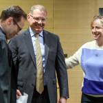Judge Paul Thompson, left, with Strom Peterson and his wife Maria Montalvo after being is sworn in Wednesday afternoon at the Snohomish County Administration Building in Everett, Washington on September 29, 2022.  (Kevin Clark / The Herald)