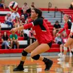 Snohomishs Liviya Harrisons bumps the ball during the match against Monroe on Tuesday, Sept. 27, 2022 in Snohomish, Washington. (Olivia Vanni / The Herald)