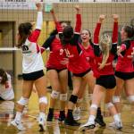 The Snohomish team reacts to beating Monroe on Tuesday, Sept. 27, 2022 in Snohomish, Washington. (Olivia Vanni / The Herald)