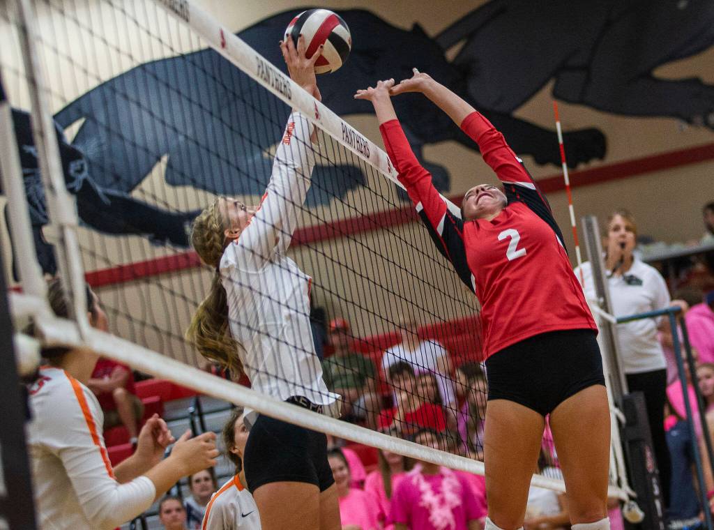 Snohomishs Ayla Grant reacts to block a tip during the match against Monroe on Tuesday, Sept. 27, 2022 in Snohomish, Washington. (Olivia Vanni / The Herald)