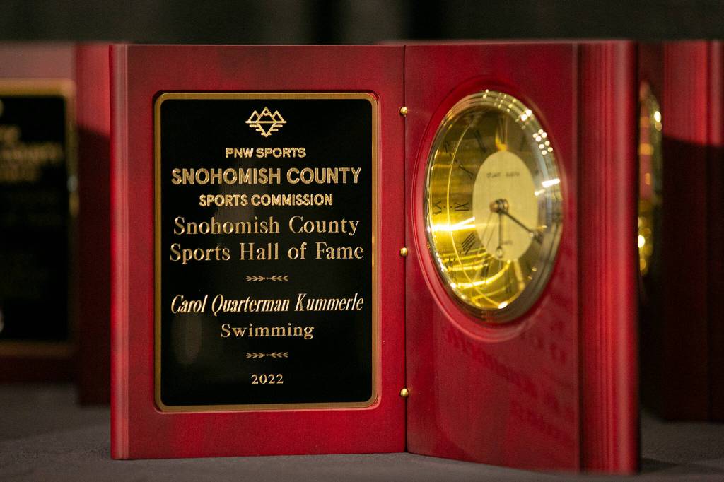 Awardds to be presented are displayed onstage during the 2022 Snohomish County Sports Hall of Fame banquet Wednesday, Sep. 28, 2022, at the Edward D. Hansen Conference Center in Everett, Washington. (Ryan Berry / The Herald)