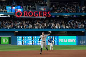 New York Yankees designated hitter Aaron Judge runs the bases after hitting his 61st home run of the season, a two-run shot against the Toronto Blue Jays during the seventh inning of a baseball game Wednesday, Sept. 28, 2022, in Toronto. (Alex Lupul/The Canadian Press via AP)