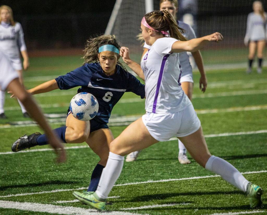 Glacier Peak senior Alyssa Castillo kicks a loose ball. (Olivia Vanni / The Herald)