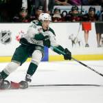 The Everett Silvertips’ Olen Zellweger maneuvers around a Vancouver Giants defender during a strong first period for the Silvertips in the first round of the WHL playoffs Friday, April 22, 2022, at Angel of the Winds Arena in Everett, Washington. (Ryan Berry / The Herald)