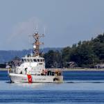 A Coast Guard cutter searches for a crashed chartered floatplane near Mutiny Bay on Sept. 5, in Freeland. (Kevin Clark / The Herald)