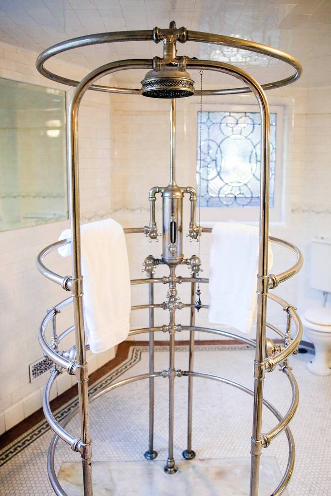 A needle shower in the Rucker Mansion in Everett, Washington on Oct. 11 in Everett. (Kevin Clark / The Herald)