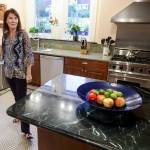 Brenda Kerr in caterer kitchen at her home, the Rucker Mansion on Oct. 11 in Everett. (Kevin Clark / The Herald)