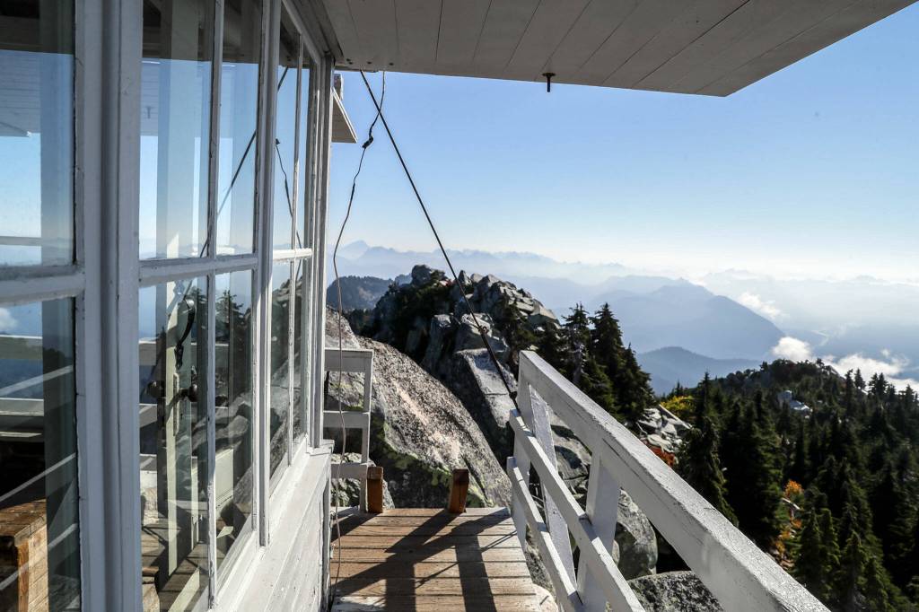 The view from the Mount Pilchuck Lookout, a mile above the Snohomish County lowlands. (Kevin Clark / The Herald)