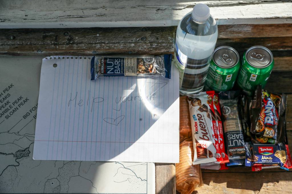 Hikers can take a snack or leave a snack at the lookout. (Kevin Clark / The Herald)