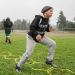 Nicole Pelham, owner and player, of the Seattle Spartans runs through drills during practice on Sept. 3, in Shoreline. (Kevin Clark / The Herald)