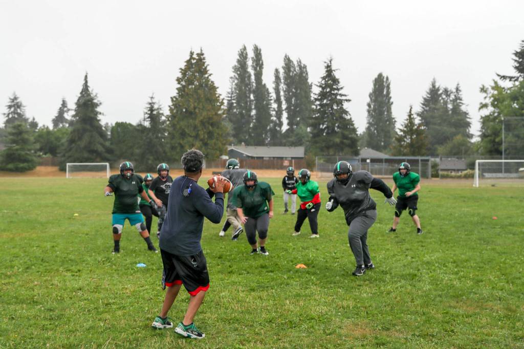 The Seattle Spartans practice on Sept. 3, in Shoreline. (Kevin Clark / The Herald)
