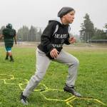 Nicole Pelham, owner and player, of the Seattle Spartans runs through drills during practice Saturday morning in Shoreline, Washington on September 3, 2022. (Kevin Clark / The Herald)