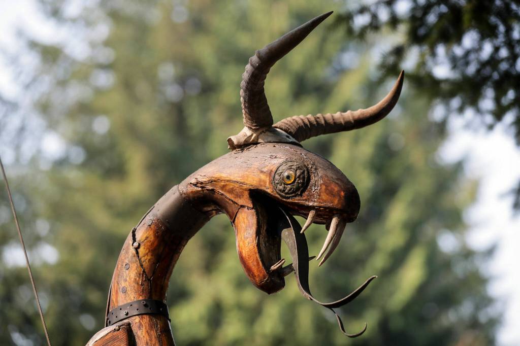 This dragon head adorns the bow of the Osa. (Kevin Clark / The Herald)