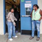 Rema Ermias, left, talks with Tanya King after recess on Sept. 14 at Beverly Elementary, in Lynnwood. (Kevin Clark / The Herald)