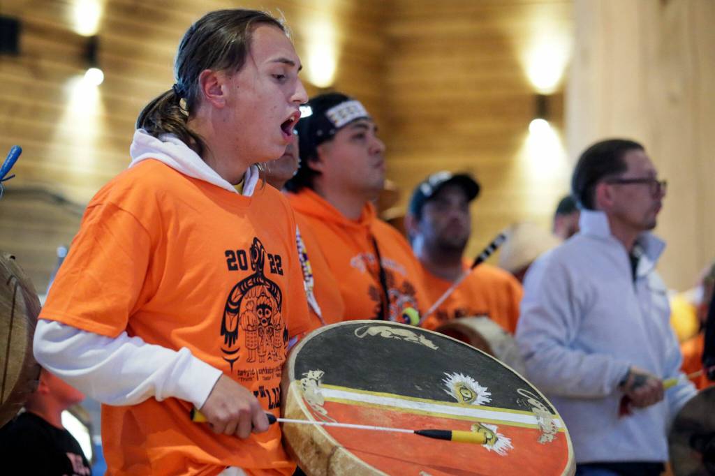 Tarynn Fryberg sings to start an assemble for the National Day for Truth and Reconciliation and Orange Shirt Day Friday evening at Tulalip Gathering Hall on Sept. 30, in Tulalip. (Kevin Clark / The Herald)