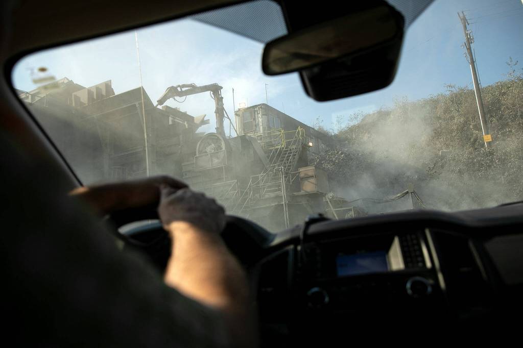 A jaw crusher machine churns away at the Cadman, Inc. sand and gravel mine on Monday, in Granite Falls. (Ryan Berry / The Herald)