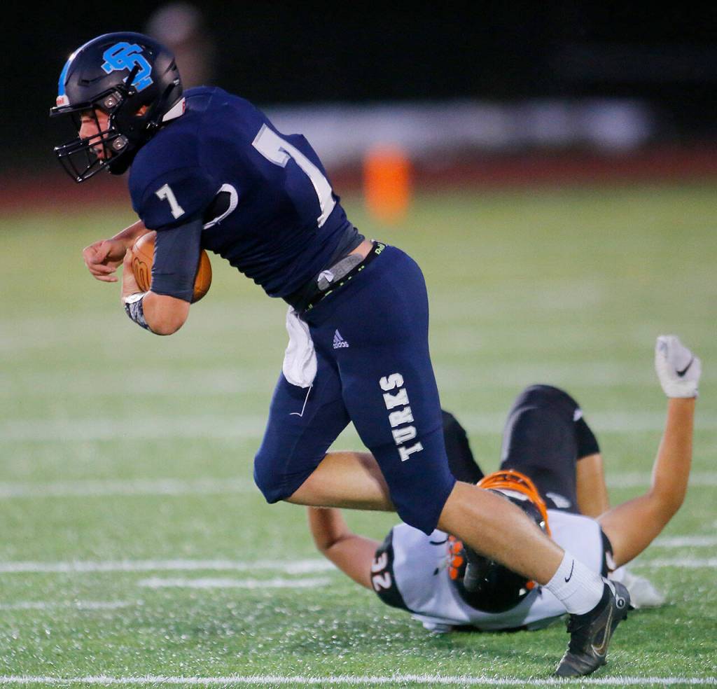 Sultans Westin Galle slips a tackle on a keeper against Granite Falls on Friday, Sep. 30, 2022, at Sultan High School in Sultan, Washington. (Ryan Berry / The Herald)
