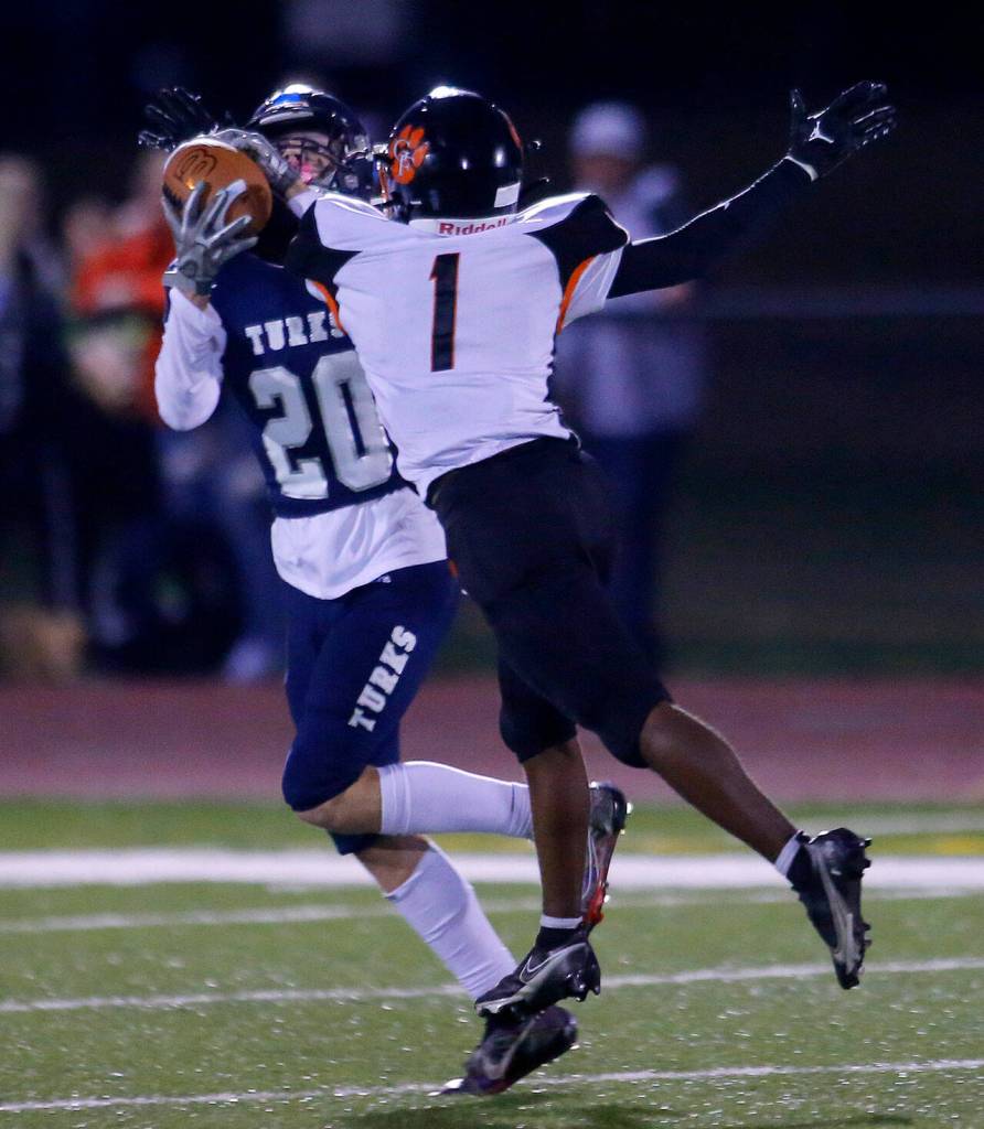 Granite Falls Javario Adams gets his arm in the way to break up a deep throw against Sultan on Friday, Sep. 30, 2022, at Sultan High School in Sultan, Washington. (Ryan Berry / The Herald)