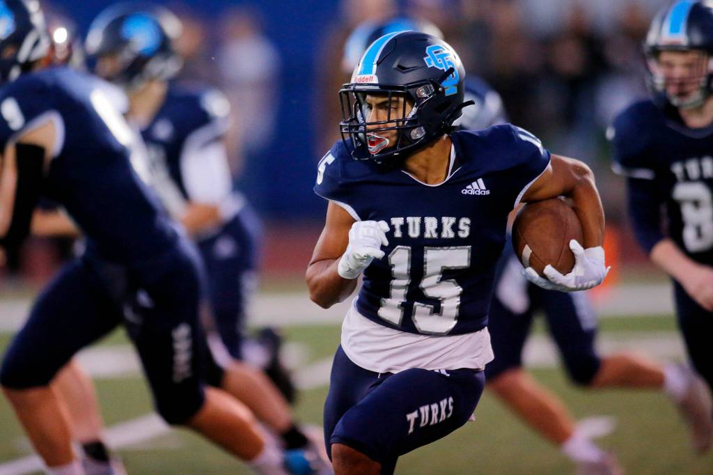 Sultans Julio Vargas takes the opening kickoff against Granite Falls on Friday, Sep. 30, 2022, at Sultan High School in Sultan, Washington. (Ryan Berry / The Herald)