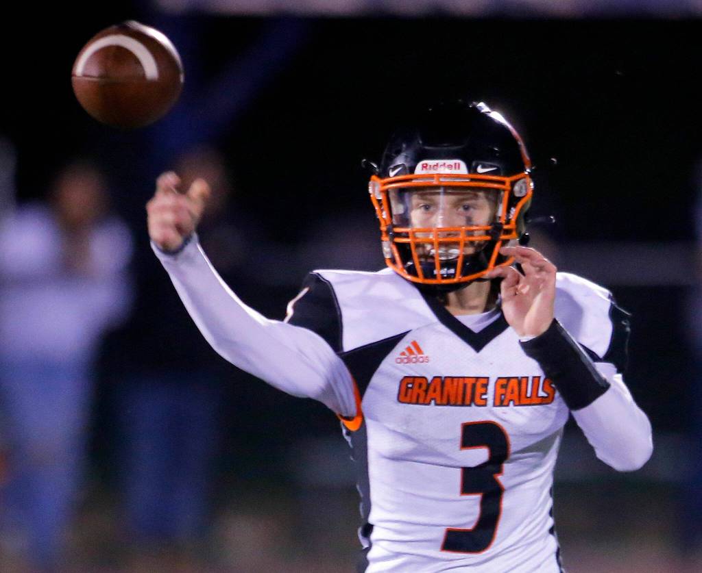 Granite Falls Connor Gillen throws a short pass against Sultan on Friday, Sep. 30, 2022, at Sultan High School in Sultan, Washington. (Ryan Berry / The Herald)