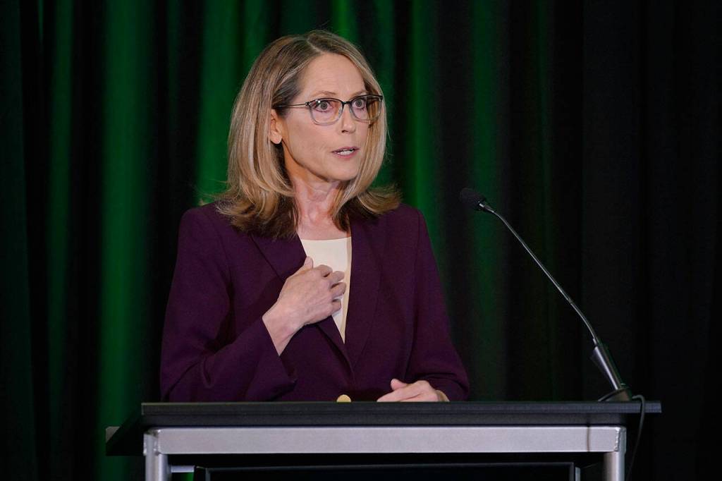 Pierce County Auditor Julie Anderson, who is running as a nonpartisan, takes part in a debate with Washington Secretary of State Steve Hobbs, a Democrat, on Aug. 17, in Olympia. Hobbs and Anderson are seeking to fill the remaining two years of the term of Republican Secretary of State Kim Wyman, who left to take a key election security job in the Biden administration. (AP Photo/Ted S. Warren)
