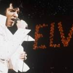 FILE - This 1972 file photo shows Elvis Presley during a performance. The AP reported on July 14, 2017, that a story claiming a dead homeless man in San Diego was identified as Presley is a hoax. Presley died in 1977. (AP Photo, File)