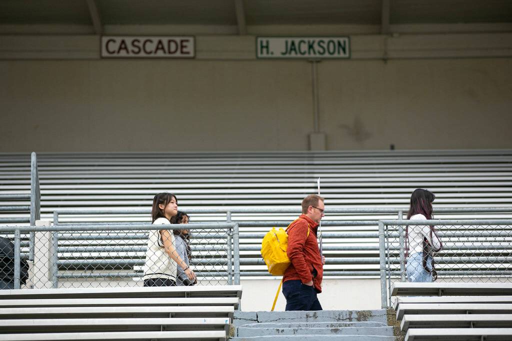 Students and teachers file into the stadium during an Everett Public Schools emergency drill on Thursday, at Everett Memorial Stadium in Everett. (Ryan Berry / The Herald)