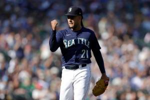 Seattle Mariners starting pitcher Luis Castillo pumps his fist after pitching against the Oakland Athletics in the fifth inning of a baseball game, Saturday, Oct. 1, 2022, in Seattle. (AP Photo/John Froschauer)