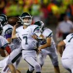Edmonds-Woodways Steven Warren Jr. steps up in the pocket to make a pass against Snohomish on Sep. 23 at Snohomish High School. Warren leads the area in passing yards. (Ryan Berry / The Herald)