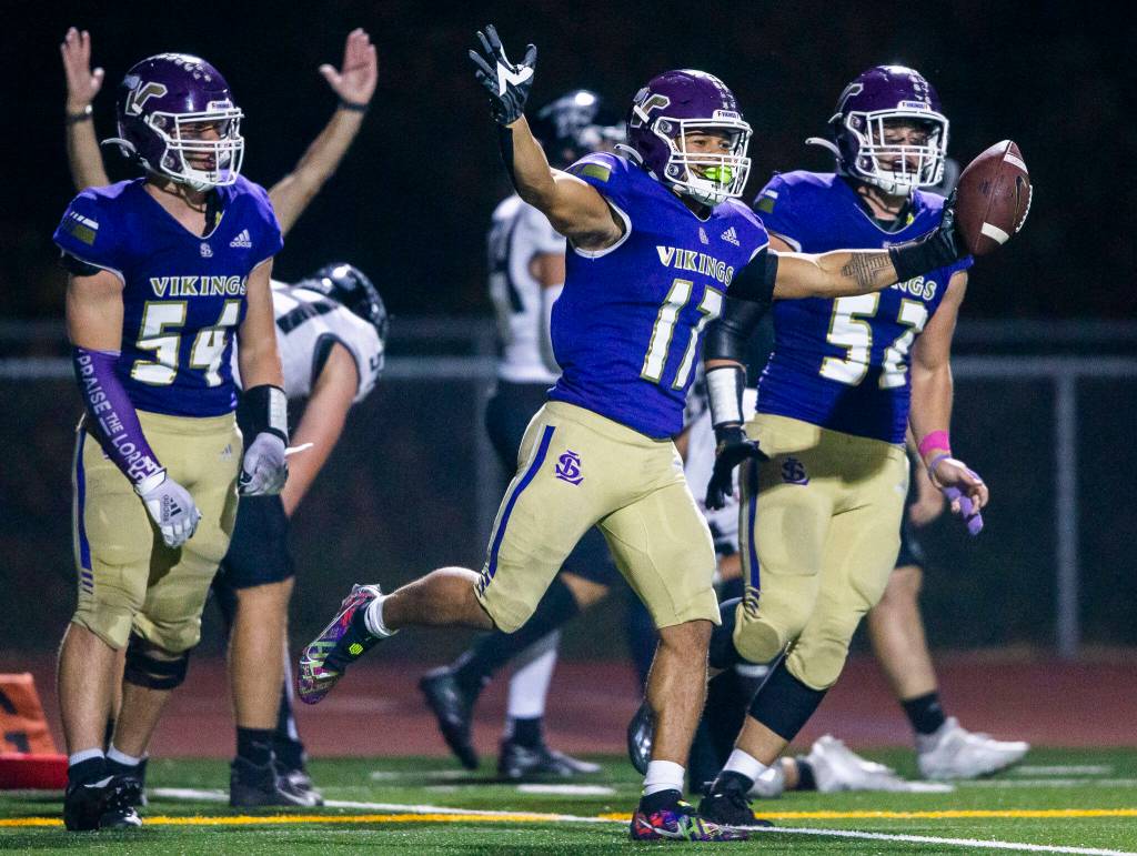 Limar celebrates after one of his five touchdown runs. (Olivia Vanni / The Herald)