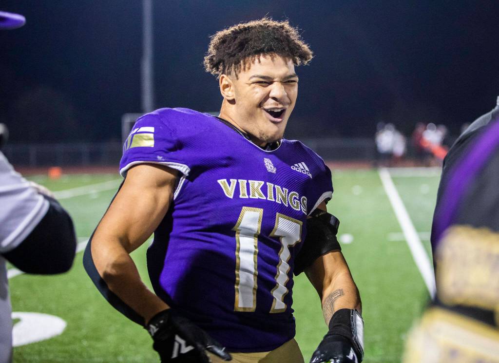 Lake Stevens Jayden Limar reacts to scoring another touchdown during the game against Eastlake on Friday, Oct. 7, 2022 in Lake Stevens, Washington. (Olivia Vanni / The Herald)