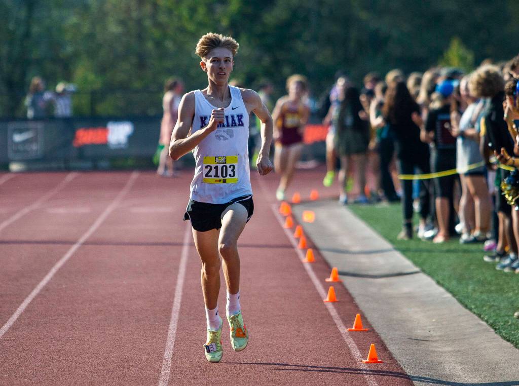 Kamiak senior Jaedyn Chase broke the 16-minute mark and placed fourth in the boys gold race. (Olivia Vanni / The Herald)