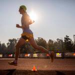 A boys elite runner makes their way toward the finish line at the Hole In The Wall Invitational on Saturday, Oct. 8, 2022 in Arlington, Washington. (Olivia Vanni / The Herald)