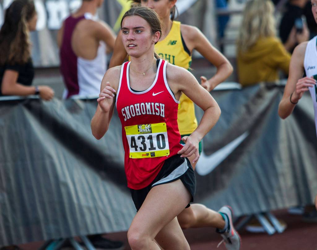 Snohomishs Paige Gerrard runs their first lap in the girls elite race at the Hole In The Wall Invitational on Saturday, Oct. 8, 2022 in Arlington, Washington. (Olivia Vanni / The Herald)