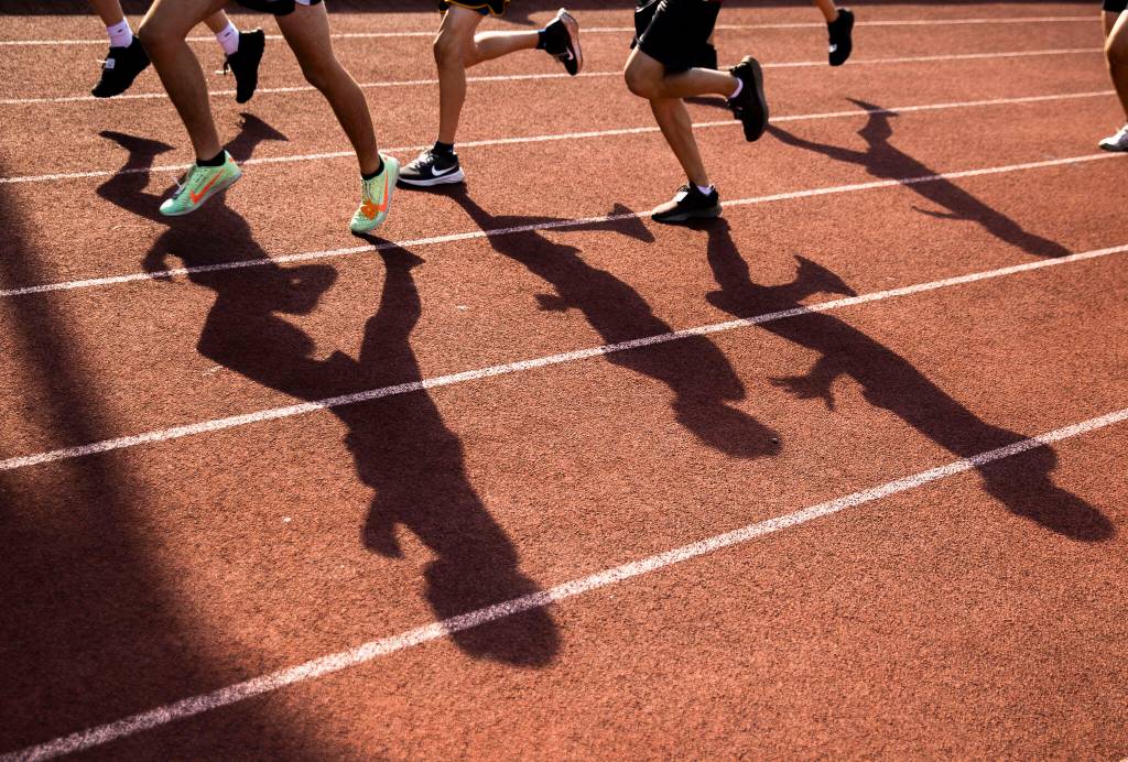 Runners make their way through the course at the Hole In The Wall Invitational on Saturday, Oct. 8, 2022 in Arlington, Washington. (Olivia Vanni / The Herald)