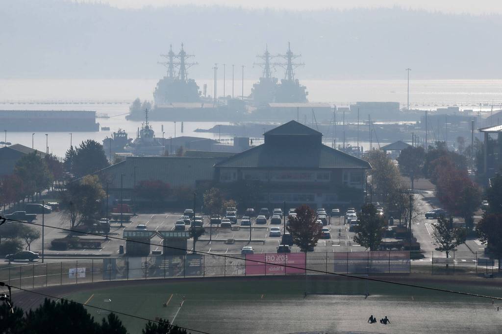 Naval ships at rest at the Everett Naval Base in the smokey and hazy weather of Monday afternoon in Everett, Washington on October 10, 2022. (Kevin Clark / The Herald)