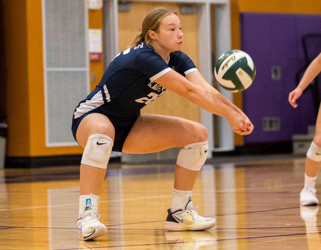 Glacier Peaks Ava Nowak digs the ball during the match against Lake Stevens on Tuesday, Oct. 11, 2022 in Lake Stevens, Washington. (Olivia Vanni / The Herald)