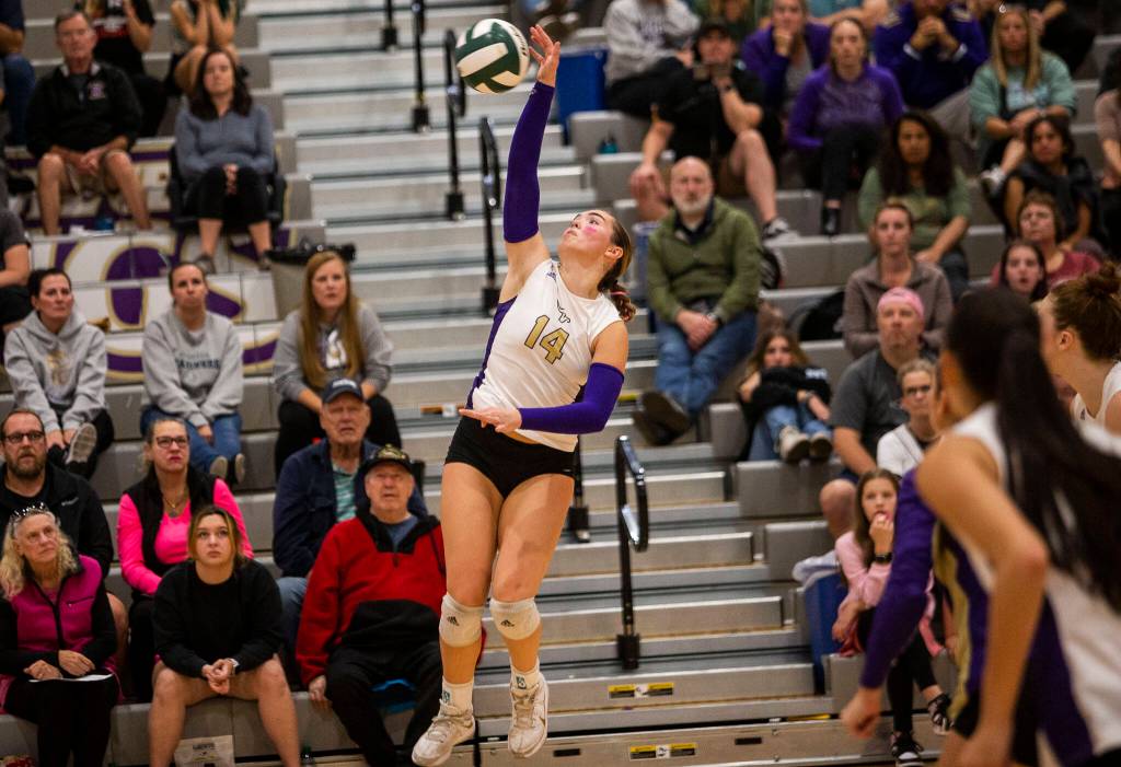 Lake Stevens Jamie Call spikes the ball during the match against Glacier Peak on Tuesday, Oct. 11, 2022 in Lake Stevens, Washington. (Olivia Vanni / The Herald)