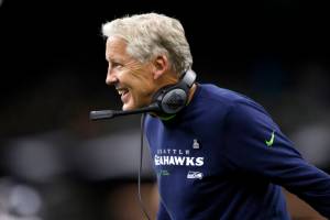 Seattle Seahawks head coach Pete Carroll celebrates Tariq Woolen's interception during an NFL football game against the New Orleans Saints in New Orleans, Sunday, Oct. 9, 2022. (AP Photo/Derick Hingle)