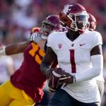 Washington State quarterback Cameron Ward (1) prepares to throw during the first half of a game against Southern California on Oct. 8 in Los Angeles. (AP Photo/Marcio Jose Sanchez)