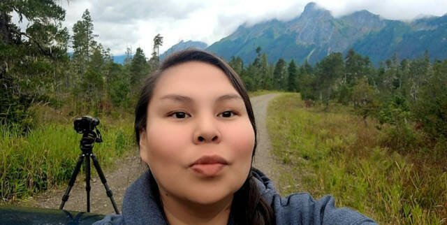 Elleana Elliott snaps a selfie while photographing bears on Chichagof Island.