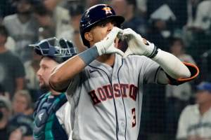 Houston Astros' Jeremy Pena celebrates after hitting a home run against the Seattle Mariners during the 18th inning in Game 3 of an American League Division Series baseball game Saturday, Oct. 15, 2022, in Seattle. (AP Photo/Ted S. Warren)
