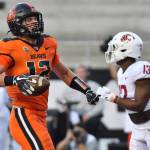 Oregon States Jack Colletto celebrates in front of Washington State defensive back Jordan Lee after his touchdown during the first half of a game Saturday in Corvallis, Ore. (AP Photo/Mark Ylen)