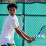Steven Anderson, sophomore, returns during an intra squad match at Edmonds-Woodway High School in Edmonds, Washington on October 13, 2022. (Kevin Clark / The Herald)