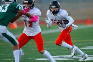 Monroe’s Aidan Gamble turns upfield after a short reception against Edmonds-Woodway on Friday, Oct. 14, 2022, at Edmonds School District Stadium in Edmonds, Washington. (Ryan Berry / The Herald)