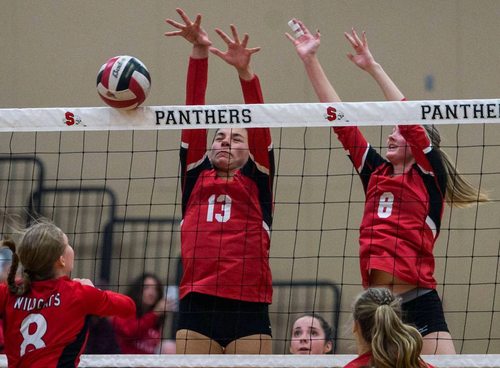 Snohomishs Arianna Galvan blocks a spike during the match against Archbishop Murphy on Wednesday, Oct. 19, 2022 in Snohomish, Washington. (Olivia Vanni / The Herald)